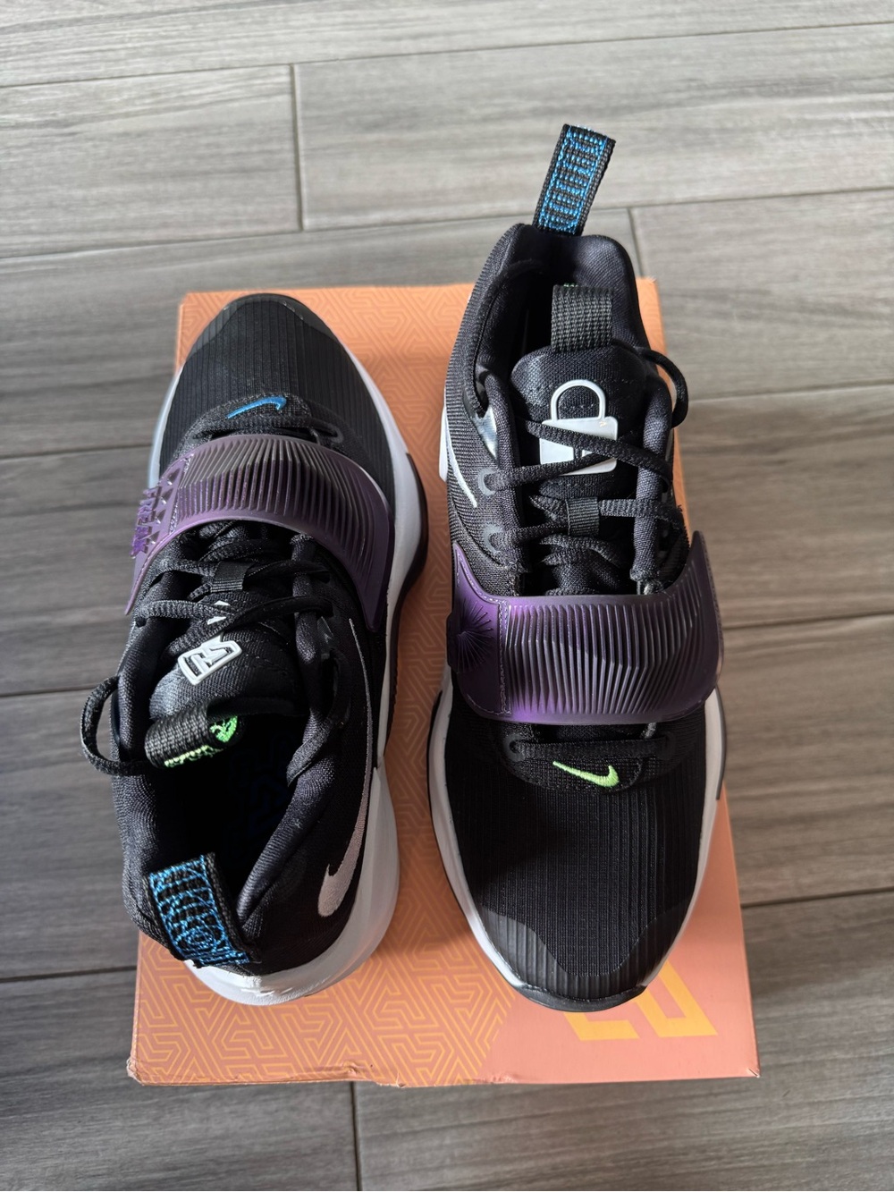 Nike Kids Black Sneakers with Purple Strap and Green Swoosh